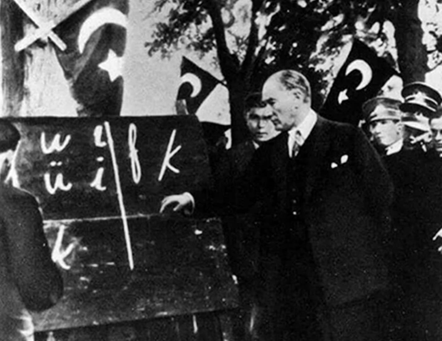 Mustafa Kemal Atatürk writing the Latin script on a blackboard